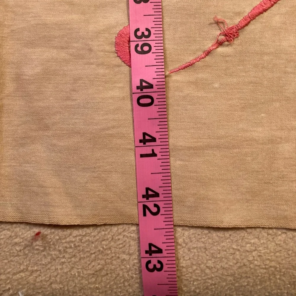 Vintage embroidery muslin, three corners begun, one ink outline blue pink red